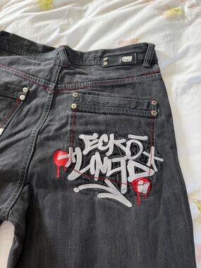 Vintage Ecko Unlimited Men's Black Jeans with White Graffiti & Red Accents 34x32